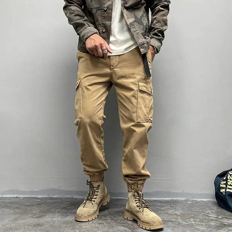 Solto masculino cor sólida grande bolso botão carga calças moda homem novo clássico rua casual ligar um dos pés calças masculinas