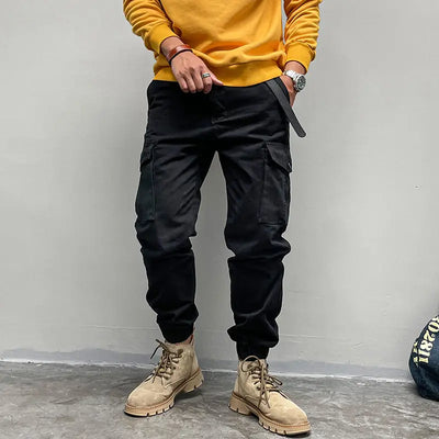 Solto masculino cor sólida grande bolso botão carga calças moda homem novo clássico rua casual ligar um dos pés calças masculinas